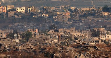 A picture taken from the Israeli side of the border with the Gaza Strip shows destroyed buildings in the nothern sector of the besieged Palestinian territory, May 22, 2025. (AFP Photo) 
