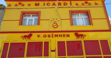 Galatasaray superfan Mehdi Keskinkılınç&#039;s yellow-and-red house, featuring the names of Victor Osimhen and Mauro Icardi, Diyarbakır, Türkiye, May 22, 2025. (IHA Photo)