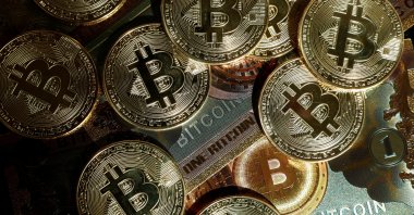 Representations of the cryptocurrency bitcoin are seen in this illustration picture taken in Paris, France, March 9, 2024. (Reuters Photo)