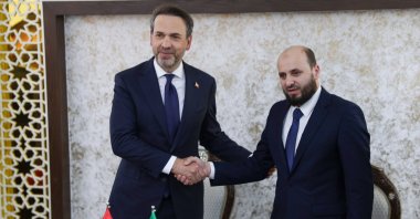 Energy and Natural Resources Minister Alparslan Bayraktar (L) shakes hands with his Syrian counterpart, Mohammed al-Bashir, Damascus, Syria, May 22, 2025. (AA Photo)