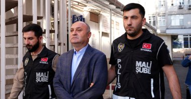 Police detain Mustafa Akın, head of Ekrem Imamoğlu&#039;s security team, in a corruption investigation against the Istanbul Metropolitan Municipality (IBB), Istanbul, Türkiye, May 23, 2025. (AA Photo)