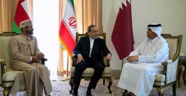 This handout picture provided by the Iranian Foreign Ministry shows Foreign Minister Abbas Araghchi (C) meeting with Qatar&#039;s Prime Minister and Foreign Minister Mohammed bin Abdulrahman al-Thani (R) and Oman&#039;s Foreign Minister Sayyid Badr al-Busaidi (L), in Tehran, May 18, 2025. (Photo by Iranian Presidency / AFP)