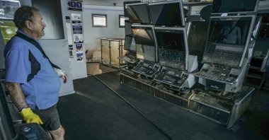  A man cleans a property following flooding in Taree, New South Wales, Australia, May 24, 2025. (EPA Photo)