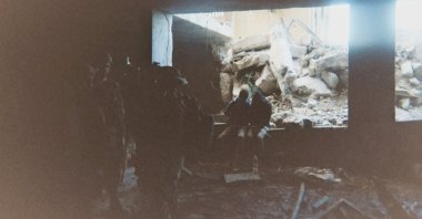 This photo provided by Breaking the Silence, a whistleblower group of former Israeli soldiers, shows two detainees used as human shields being held inside a house in the Gaza City area in 2024. (AP Photo)