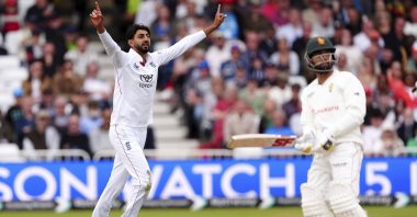 England's Shoaib Bashir (L) celebrates taking the wicket of Zimbabwe's Sikandar Raza on day three on day three of the Rothesay International Test match between England and Zimbabwe at Trent Bridge, Nottingham, U.K., May 24, 2025. (AP Photo)
