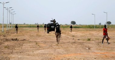 Nigerian Security Forces patrol outside Ngarannam to provide security during the inspection visit of the representative of the United Nations Development Program (UNDP) to Nigeria, Mohamed Yahya, ahead of the community re-opening ceremony, which was destroyed by Boko Haram terrorists in 2015, Ngarannam, Borno State, Nigeria, Oct. 21, 2022. (Reuters Photo)