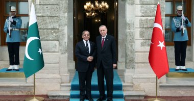 President Recep Tayyip Erdoğan shakes hands with Pakistani Prime Minister Shahbaz Sharif at the Dolmabahçe Palace, Istanbul, Türkiye, May 25, 2025. (IHA Photo)