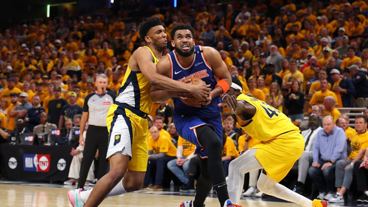 Knicks&#039; Karl-Anthony Towns drives the ball to the basket against two Indiana Pacers players in an NBA Playoffs game in Indianapolis, Indiana, U.S., May 25, 2025. (AFP Photo)