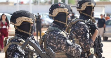 Members of the PKK-linked Syrian Democratic Forces (SDF) secure an area in Qamishli, northeast Syria, April 26, 2025.  (EPA Photo)