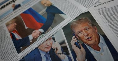 Daily newspapers with covers, dedicated to the recent phone call of Russian President Vladimir Putin and U.S. President Donald Trump, are laid out at a newsstand in a street in Moscow, Russia, Feb. 13, 2025. (Reuters Photo)