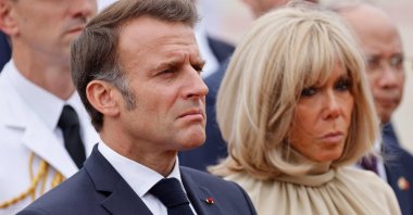 France&#039;s President Emmanuel Macron (L) and first lady Brigitte Macron take part in a ceremony, Hanoi, Vietnam, May 26, 2025. (AFP Photo)