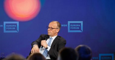 German Chancellor Friedrich Merz takes part in a discussion on &#039;Wars, crises, chancellorship: German answers to European questions&#039; on stage of the &#039;Re:Publica 25&#039; fair ground during the opening of the &#039;Re:publica 25&#039; digital conference in Berlin, May 26, 2025. (AFP Photo)
