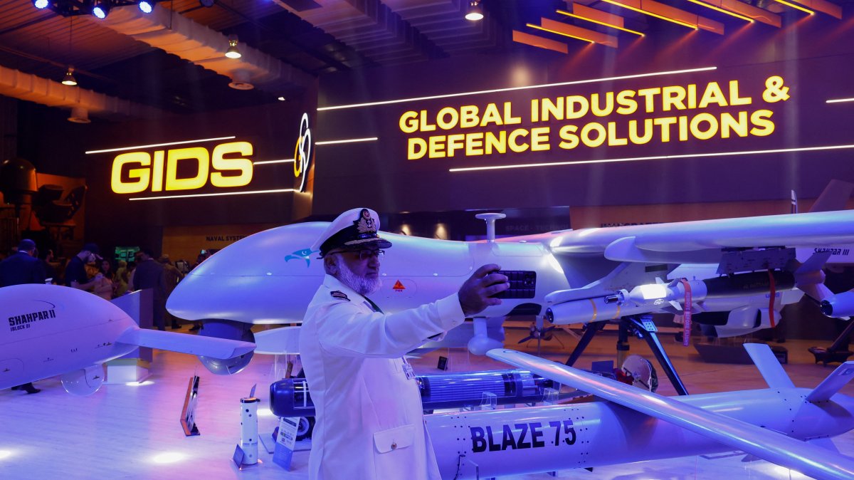A member of the Pakistan armed forces takes a selfie with an unmanned combat aerial vehicle during IDEAS 2024 in Karachi, Pakistan, Nov. 21, 2024. (Reuters Photo) A member of the Pakistan armed forces takes a selfie with an unmanned combat aerial vehicle during IDEAS 2024 in Karachi, Pakistan, Nov. 21, 2024. (Reuters Photo)