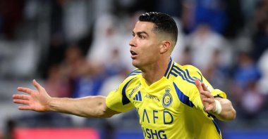 Al-Nassr&#039;s Cristiano Ronaldo celebrates scoring his team&#039;s second goal during the Saudi Pro League football match against Al-Hilal at the Kingdom Arena stadium, Riyadh, Saudi Arabia, April 4, 2025. (AFP Photo)