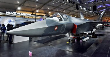 Visitors stand next to a prototype of the Advanced Medium Combat Aircraft (AMCA), India&#039;s most advanced stealth fighter jet, at the &quot;Aero India 2025&quot; air show, Yelahanka air base in Bengaluru, India, Feb. 11, 2025. (Reuters Photo)