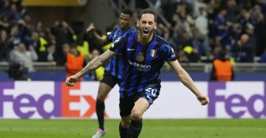 Inter Milan&#039;s Hakan Çalhanoğlu celebrates after scoring his side&#039;s second goal during the Champions League semifinal second leg against Barcelona at San Siro stadium, Milan, Italy, May 6, 2025. (AP Photo)