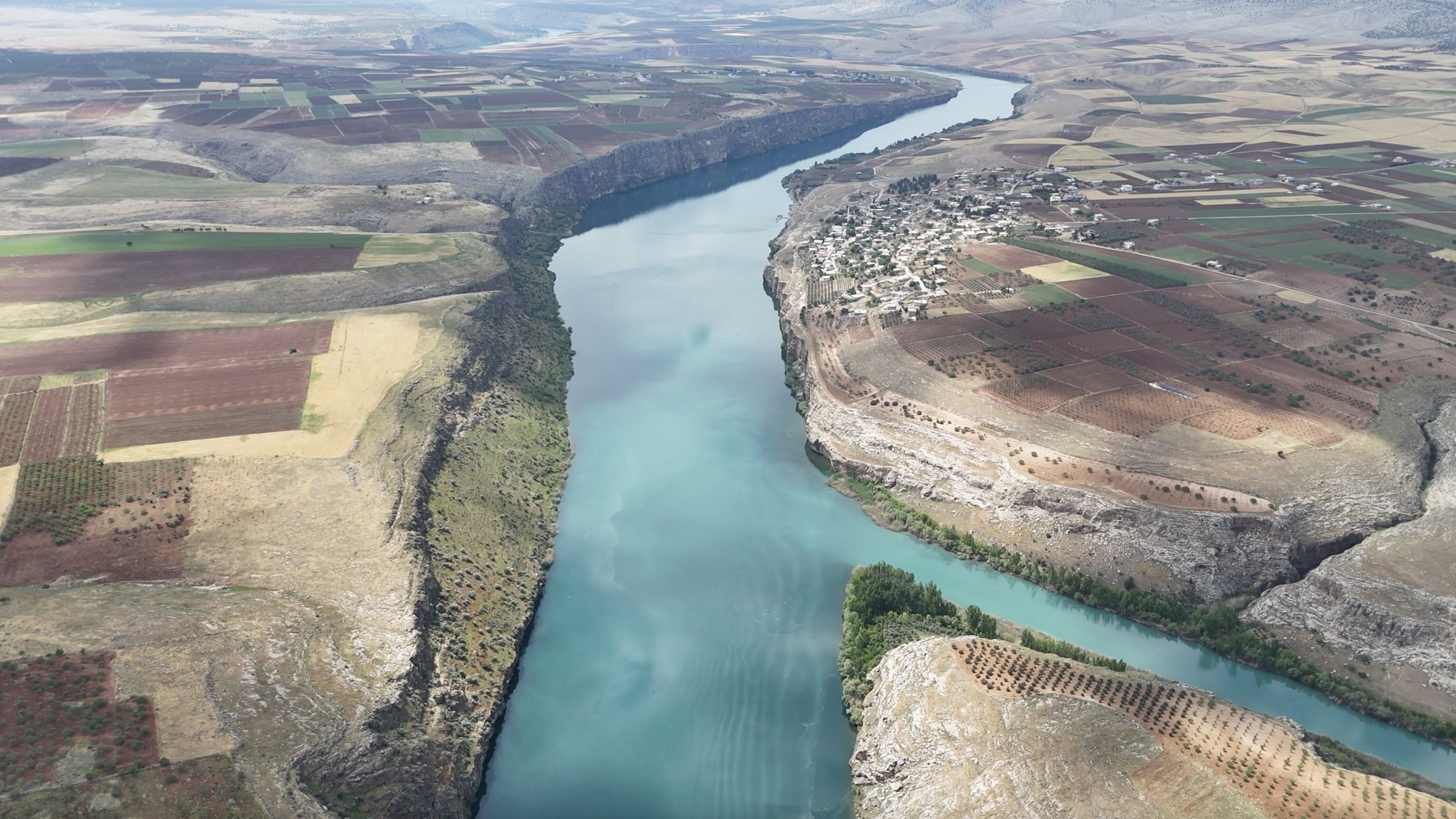 An aerial view of the Kızilin Canyon, located on the banks of the Euphrates River in the Besni district of Adıyaman, Türkiye, May 27, 2025. (AA Photo)