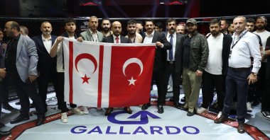 Türkiye MMA Federation President Ali Arık (C) joins a group photo after the Vendetta Fight Night Türkiye, Ankara, Türkiye, May 27, 2025. (IHA Photo) 