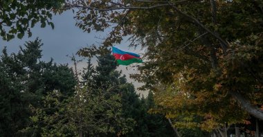 A giant Azerbaijan flag waves in the sky, Baku, Azerbaijan, Nov. 9, 2023. (Getty Images Photo)