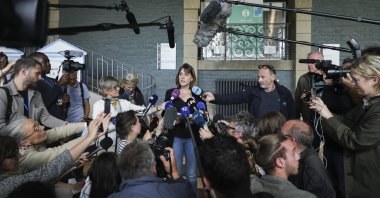 Manon Lemoine, a member of a collective of Joel Le Scouarnec victims, speaks with the press after the announcement of the verdict in Joel Le Scouarnec&#039;s trial in Vannes, France, May 28, 2025. (EPA Photo)