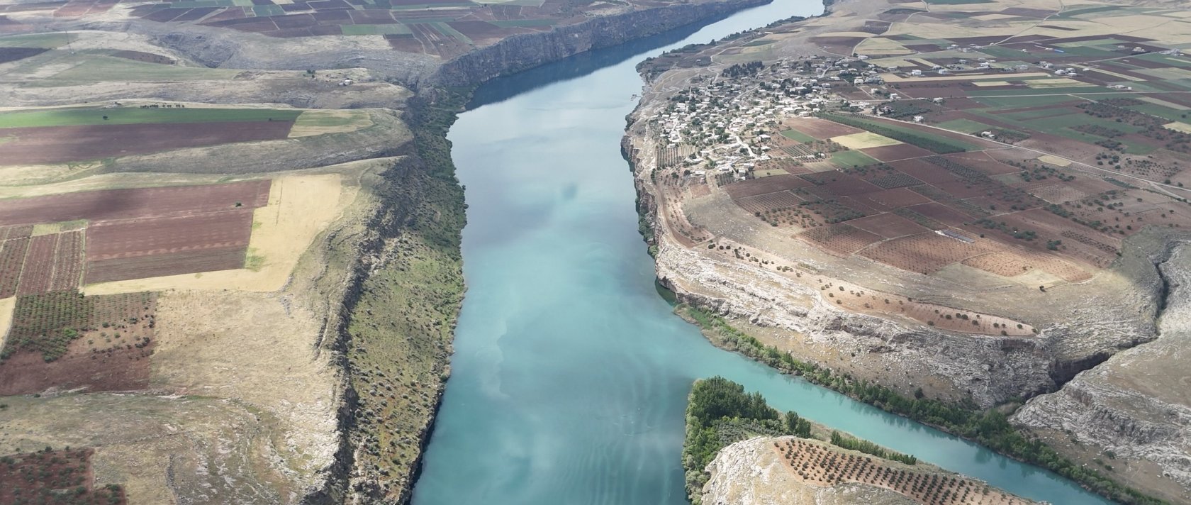 An aerial view of the Kızilin Canyon, located on the banks of the Euphrates River in the Besni district of Adıyaman, Türkiye, May 27, 2025. (AA Photo)