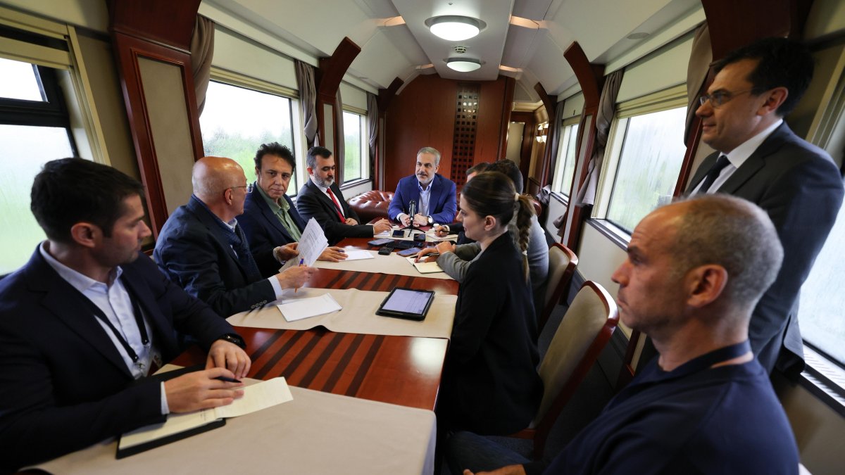Foreign Minister Hakan Fidan speaks to reporters as he heads to Kyiv from Warsaw, May 29, 2025. (AA Photo)