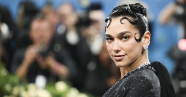 Dua Lipa poses during the Met Gala, an annual fundraising gala held for the benefit of the Metropolitan Museum of Art&#039;s Costume Institute, with this year&#039;s theme &quot;Superfine: Tailoring Black Style,&quot; in New York City, New York, U.S., May 5, 2025. (Reuters Photo)