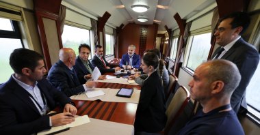 Foreign Minister Hakan Fidan speaks to reporters as he heads to Kyiv from Warsaw, May 29, 2025. (AA Photo)