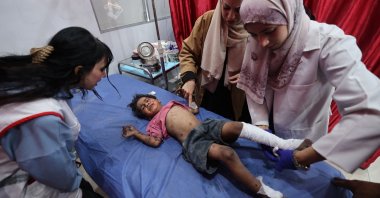 An injured child receives medical care at the Al-Awda Hospital in the Nuseirat refugee camp in the central Gaza Strip, following an Israeli strike, May 29, 2025. (AFP Photo)