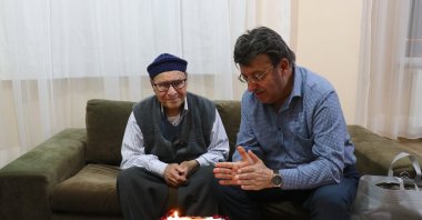 Nebi Önay (L) celebrates his 100th birthday for the first time with a surprise party at his home, Van, Türkiye, May 18, 2025. (AA Photo) 