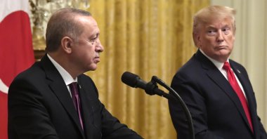 U.S. President Donald Trump (R) looks at President Recep Tayyip Erdoğan as a reporter asks a question at a press conference in the East Room of the White House, Washington, U.S., Nov. 13, 2019. (EPA Photo)