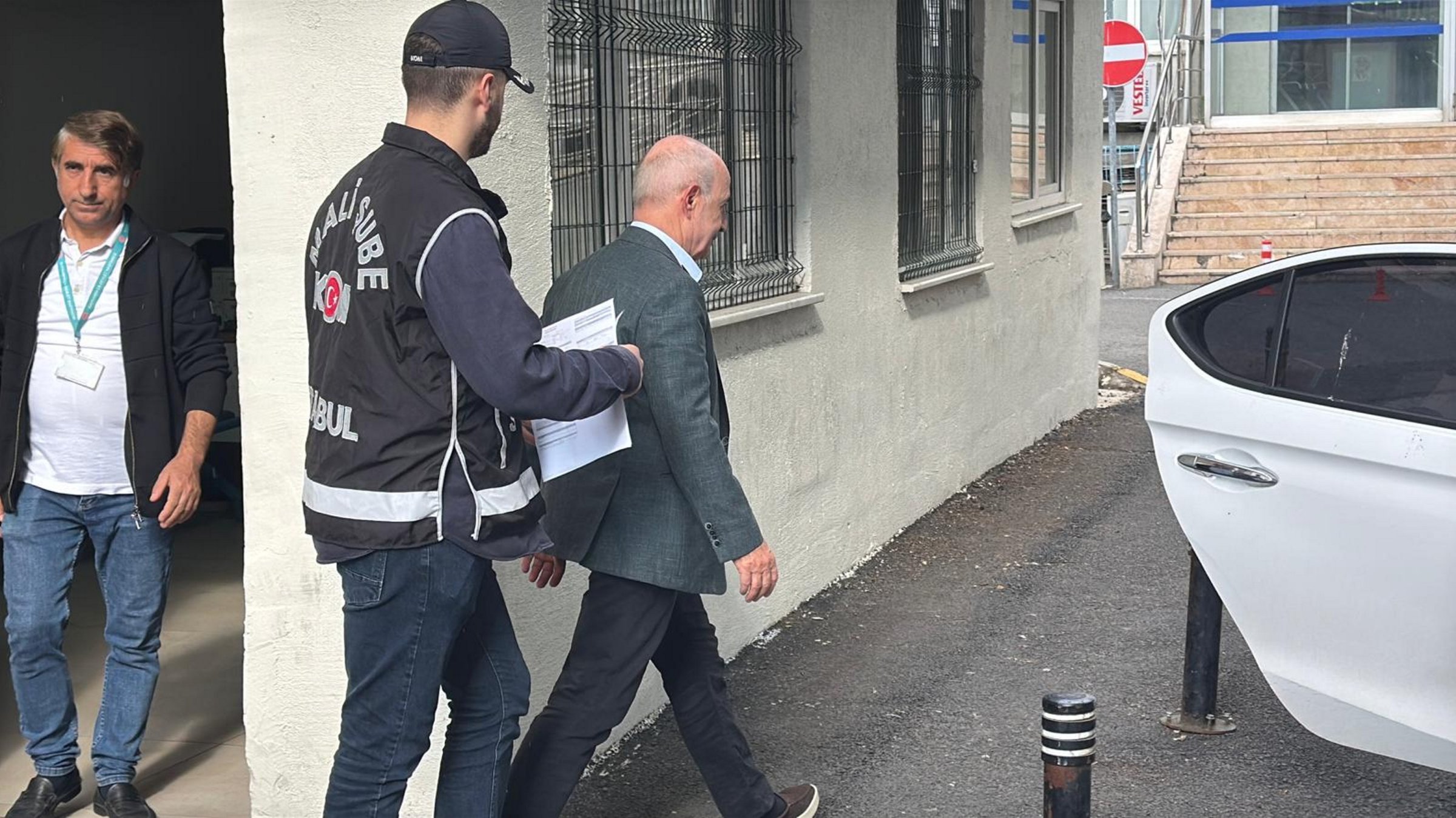 Police escort Büyükçekmece Mayor Hasan Akgün after his detention, Istanbul, Türkiye, May 31, 2025. (AA Photo)