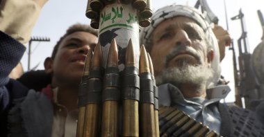 A Houthi supporter wears a gun bullet belt during an anti-U.S. and anti-Israel protest, Sanaa, Yemen, May 23, 2025. (EPA Photo) ARHAB