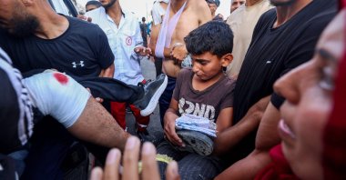 Palestinian rescuers evacuate injured people in an ambulance after an Israeli drone reportedly opened fire on civilian gatherings near an aid distribution point, central Gaza Strip, Palestine, June 1, 2025. (AFP Photo)