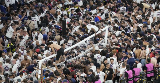 Fans of PSG invade the pitch after the Champions League final match between Paris Saint-Germain and Inter Milan at the Allianz Arena, Munich, Germany, May 31, 2025. (AP Photo)