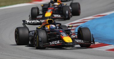 Red Bull&#039;s Max Verstappen and Red Bull&#039;s Yuki Tsunoda in action during the Spanish Grand Prix race at the Circuit de Barcelona, Catalunya, Barcelona, Spain, June 1, 2025. (Reuters Photo)