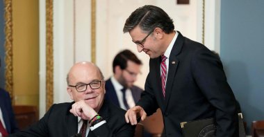 Speaker of the House Mike Johnson (R) talks to Ranking Member on the House Rules Committee James McGovern during a Rules Committee meeting on the &quot;One Big Beautiful Bill Act,&quot; Washington, U.S., May 21, 2025. (AFP Photo)