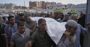 People carry the body of Reem Al-Akhras, who was killed by Israel while heading to a Gaza aid hub, during her funeral, Khan Younis, Gaza Strip, Palestine, June 3, 2025. (AP Photo)