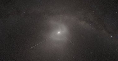 This image provided by the American Museum of Natural History shows a new planetarium show showing a backwards S-shaped spiral in what's known as the Oort Cloud far beyond Pluto. (American Museum of Natural History via AP)