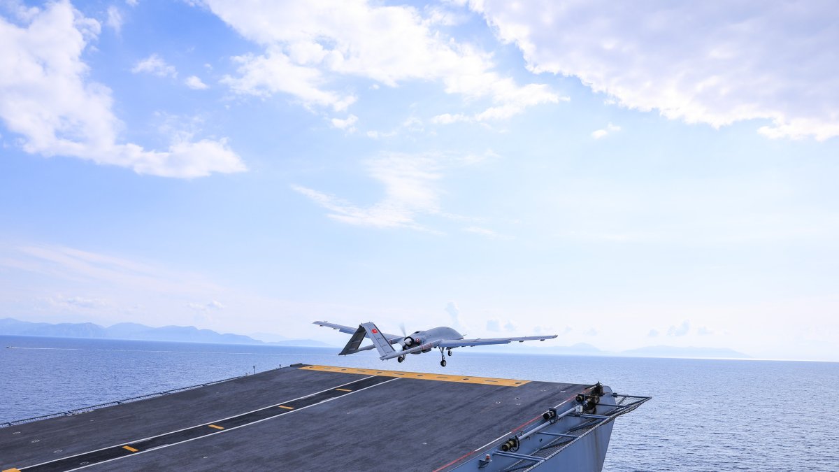 Bayraktar TB3 UCAV, developed by Turkish defense firm Baykar, is seen taking off from the TCG Anadolu at an undisclosed location, June 3, 2025. (AA Photo)