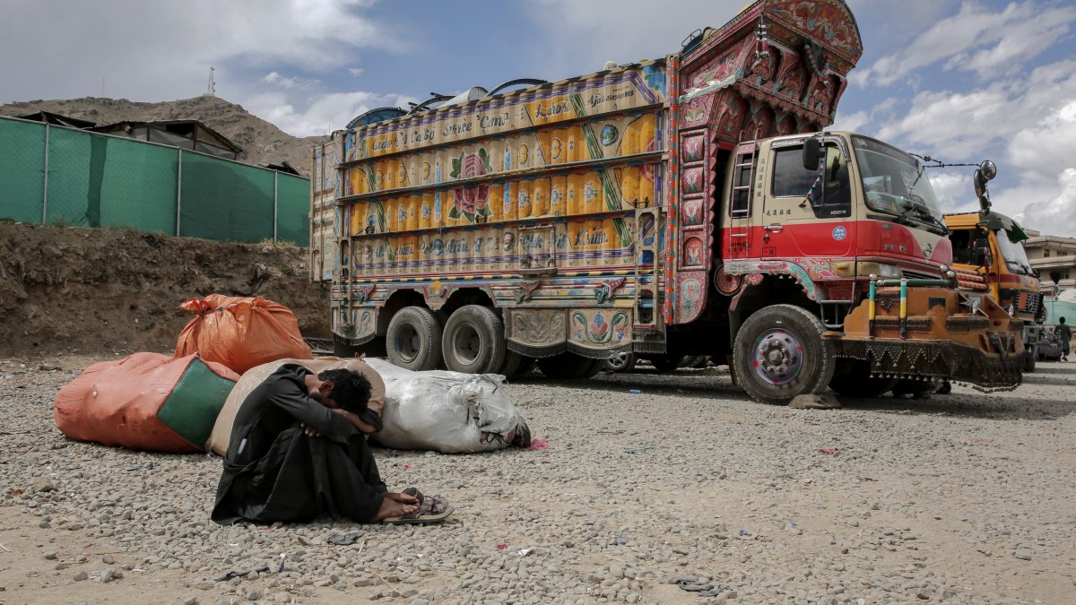 An Afghan refugee who returned from neighboring countries rests in a temporary shelter in Kabul, Afghanistan, May 21, 2025. (EPA Photo)