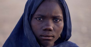 A displaced woman looks on, following Rapid Support Forces (RSF) attacks on Zamzam displacement camp, as she shelters in the town of Tawila, North Darfur, Sudan, April 16, 2025. (Reuters Photo)