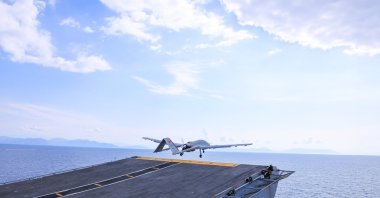 Bayraktar TB3 UCAV, developed by Turkish defense firm Baykar, is seen taking off from the TCG Anadolu at an undisclosed location, June 3, 2025. (AA Photo)