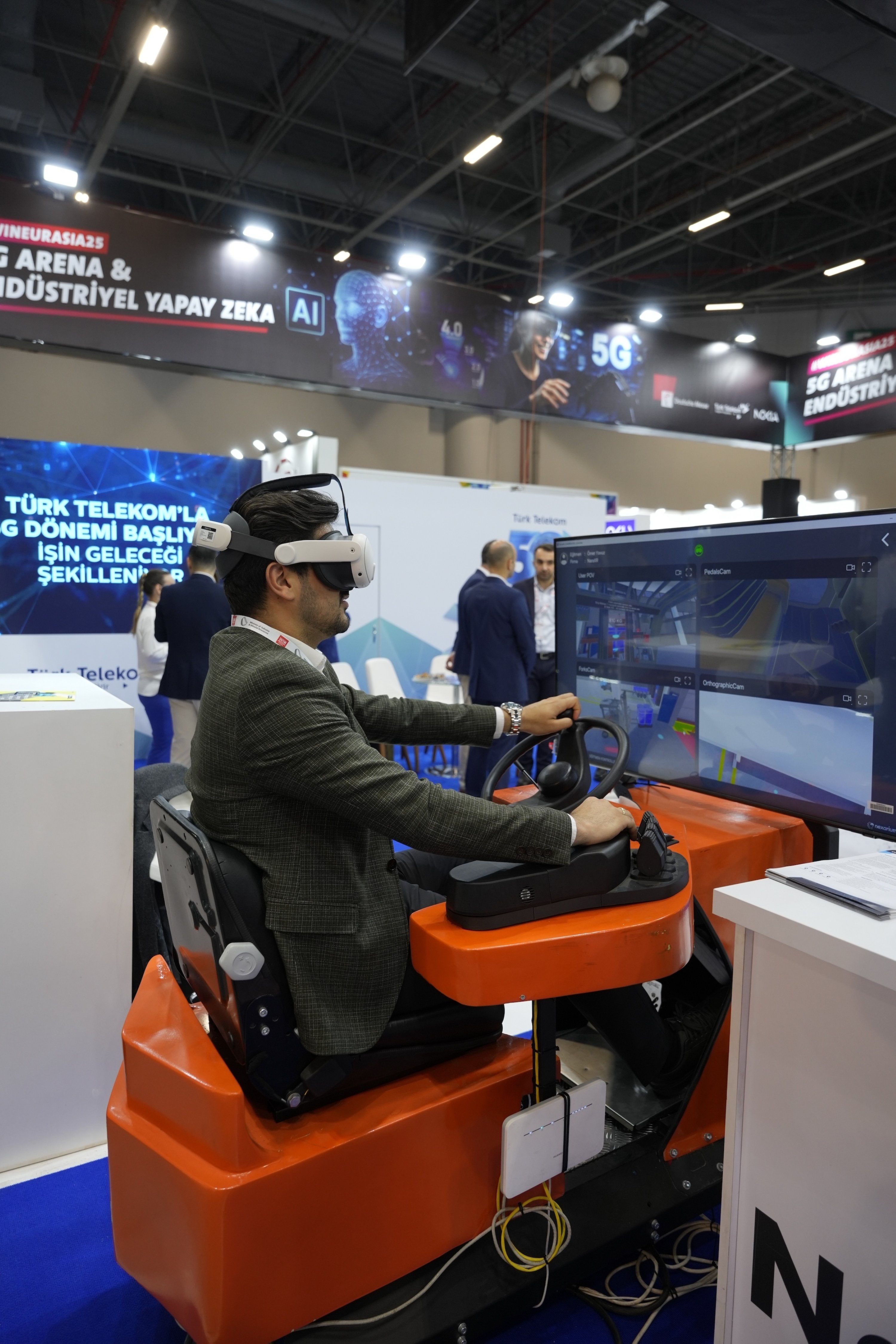 A visitor tries a simulator at the WIN EURASIA 2025 trade fair in Istanbul, Türkiye. (Courtesy of Türk Telekom)