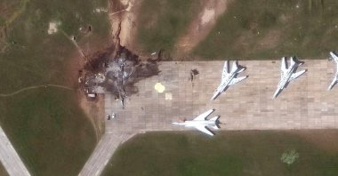 A satellite image shows a destroyed TU 22 aircraft in the aftermath of a drone strike at the Belaya air base, Irkutsk region, Russia, June 4, 2025. (Reuters Photo)