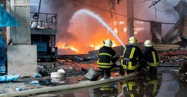 Firefighters extinguish fires following a Russian missile attack on Ukraine, Kyiv, Ukraine, June 6, 2025. (IHA Photo)