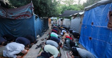 Palestinians participate in a special morning prayer on the first day of the Muslim Eid al-Adha festival, Nuseirat, Gaza Strip, Palestine, June 6, 2025. (AFP Photo)