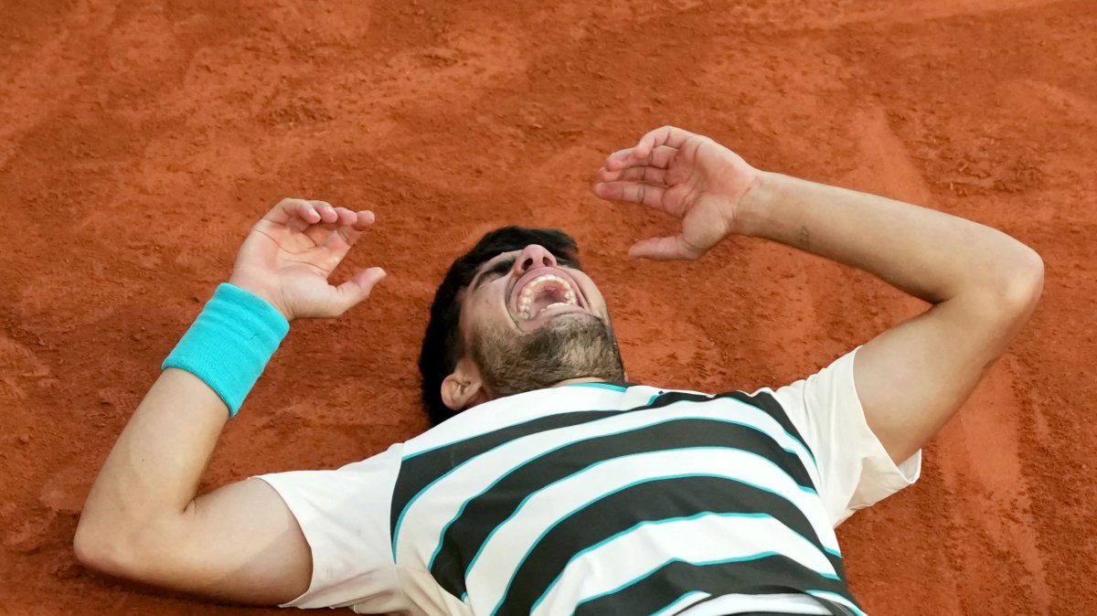 Carlos Alcaraz rallies past Sinner to retain French Open throne