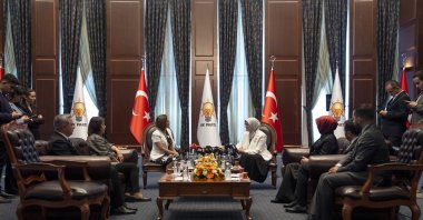 DEM Party spokesperson Cemile Turhallı Balsak (C-L) speaks to AK Party Deputy Chair Belgin Uygur (C-R) during an Eid visit to the AK Party, Ankara, Türkiye, June 7, 2025. (AA Photo)