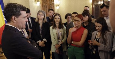 Romanian President Nicusor Dan (L) chats with reporters at Cotroceni Palace, Bucharest, Romania, June 4, 2025. (EPA Photo)
